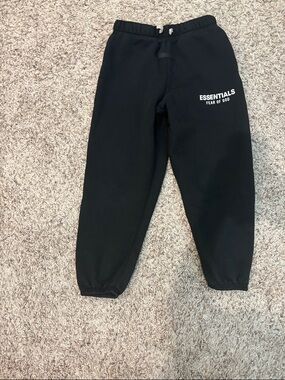 Fear of God Essentials Kids Black Joggers with White Logo